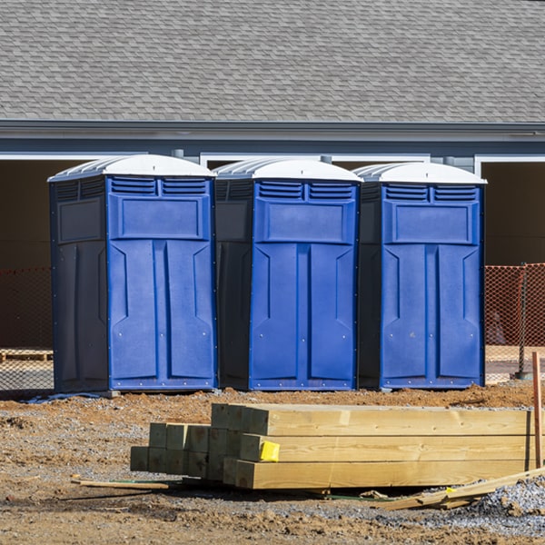 what is the cost difference between standard and deluxe porta potty rentals in Gray